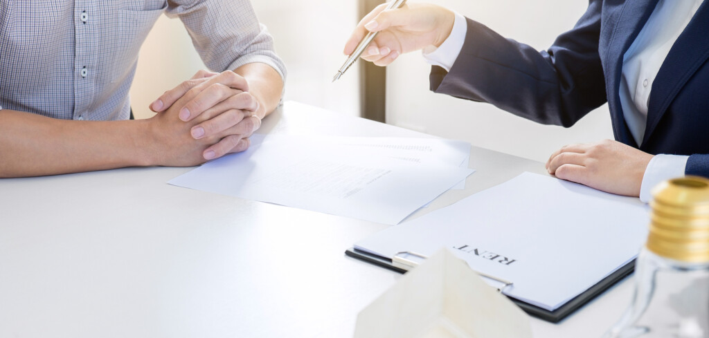 Real estate broker residential agent being analysis and making the decision a home estate loan to customer and waiting for reply to finish house and car rent listing contract.