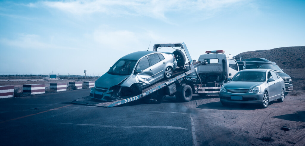 accident car on the tow truck ,traffic accident scene on the highway