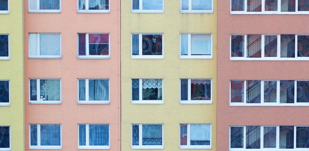 Windows of the rooms in the big apartment building.